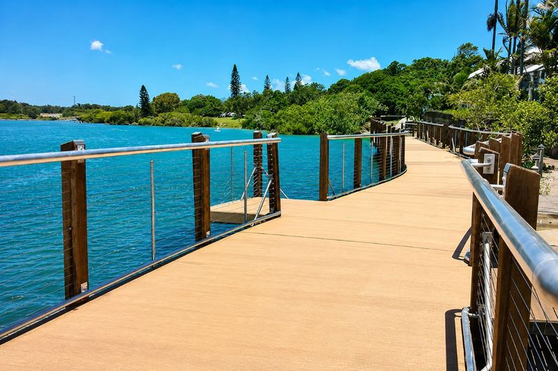 The boardwalk along Cudgen Creek at Kingscliff on a clear day